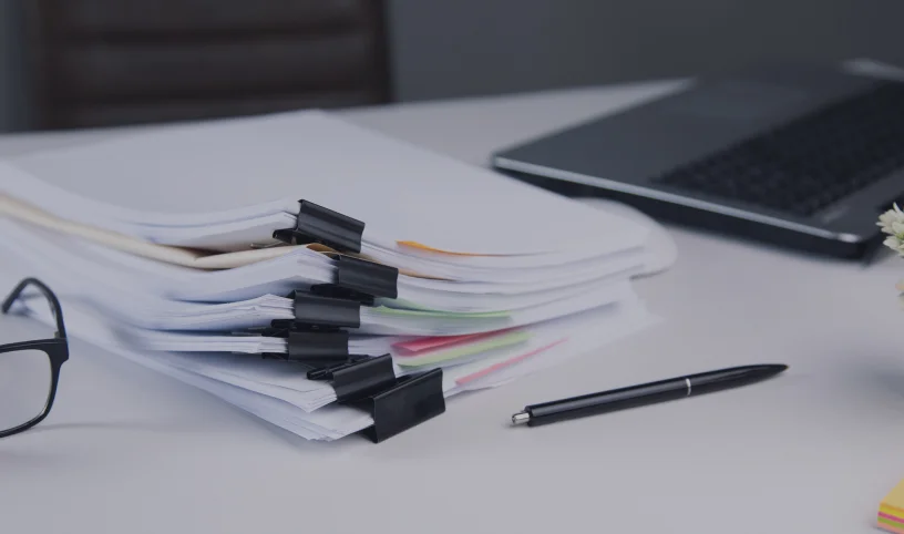 stack-business-paper-file-with-laptop-computer-desk-1-1